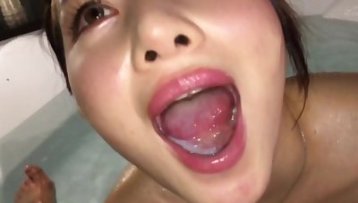 Amateur Japanese teen fills her mouth with cum